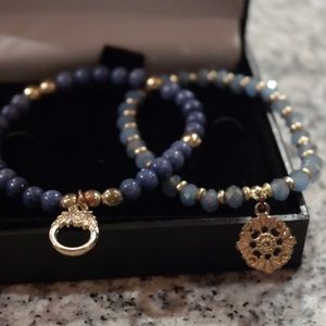 Set of matching wristlets with gold pendant